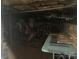 Unfinished basement storage area with utilities, stored items and concrete walls at 508 E Rice St, Landis, NC 28088