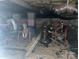 Unfinished basement storage area with utilities, stored items and concrete walls at 508 E Rice St, Landis, NC 28088