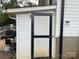 Attached storage shed off the back of the house features a gas grill at 508 E Rice St, Landis, NC 28088