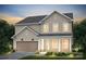Traditional two-story home with beige siding, a brick-based porch, and an attached two-car garage at 5240 Hatcher Creek Rd # 51, Charlotte, NC 28215