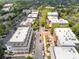 An overhead shot displays the neighborhood, including its streets, parking, trees, and buildings at 570 Sixth Baxter Xing # 16, Fort Mill, SC 29708