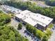 Overhead shot displays the community's amenities, including a pool, parking lot, and surrounding green space at 570 Sixth Baxter Xing # 16, Fort Mill, SC 29708