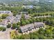 Aerial view of homes surrounded by lush trees and greenery at 570 Sixth Baxter Xing # 16, Fort Mill, SC 29708