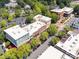 Aerial shot displays the retail and office buildings with trees lining sidewalks and parking at 570 Sixth Baxter Xing # 16, Fort Mill, SC 29708