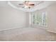 Bright bedroom offering plush carpet, natural light and a ceiling fan at 570 Sixth Baxter Xing # 16, Fort Mill, SC 29708