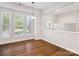 Dining room with hardwood floors, a large window and view of the front yard at 570 Sixth Baxter Xing # 16, Fort Mill, SC 29708