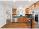 Eat-in kitchen with stainless steel appliances, tile backsplash and dark countertops at 570 Sixth Baxter Xing # 16, Fort Mill, SC 29708