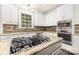 Granite counters, stainless steel appliances, and a gas cooktop add a touch of luxury to this kitchen at 6612 Saunton Ct, Charlotte, NC 28277