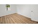 Bright bedroom with wood-look floors and a window providing natural light at 821 1St St, Kings Mountain, NC 28086