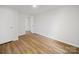A cozy bedroom featuring wood-look floors and neutral walls for a calming ambiance at 821 1St St, Kings Mountain, NC 28086