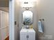 Charming bathroom features a modern sink, vanity and a decorative mirror at 101 Treeline Dr, Belmont, NC 28012