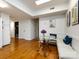 Charming breakfast nook boasts hardwood floors, a glass table, and bench seating with decorative pillows at 101 Treeline Dr, Belmont, NC 28012