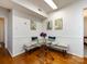 Cozy breakfast nook with hardwood floors, round table, banquette seating, and natural light at 101 Treeline Dr, Belmont, NC 28012