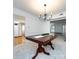 Traditional dining room features a wood table, neutral walls, and modern chandelier with hardwood view at 101 Treeline Dr, Belmont, NC 28012