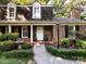 Brick home with charming front yard landscaping, featuring a water feature at 101 Treeline Dr, Belmont, NC 28012