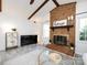 Inviting living room with brick fireplace, wood beams, and stylish decor with windows and natural light at 101 Treeline Dr, Belmont, NC 28012