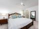 Bright bedroom with a ceiling fan and large windows bringing in natural light at 101 Treeline Dr, Belmont, NC 28012