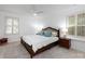 Bright bedroom with a ceiling fan and large windows bringing in natural light at 101 Treeline Dr, Belmont, NC 28012