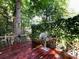Wood deck featuring built-in grill, creating a relaxing outdoor cooking and dining space at 101 Treeline Dr, Belmont, NC 28012
