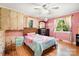 Bedroom with windows, pink walls and dresser at 1104 Pump Station Rd, Kannapolis, NC 28081