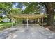 Spacious carport with sturdy support beams, providing ample covered parking at 1104 Pump Station Rd, Kannapolis, NC 28081