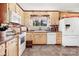 Bright kitchen featuring functional appliances, ample counter space, and plenty of storage, ideal for meal preparation at 1104 Pump Station Rd, Kannapolis, NC 28081