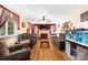 Cozy living room features hardwood floors, a fireplace, and an aquarium, creating a comfortable gathering space at 1104 Pump Station Rd, Kannapolis, NC 28081
