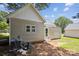 Back side of home with siding, backyard, and door at 1108 4Th St, Statesville, NC 28677