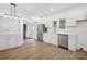 A modern kitchen featuring updated appliances, white cabinets, and plenty of light at 1108 4Th St, Statesville, NC 28677