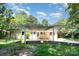Backyard view of a house with a metal carport attached at 1138 Laurel St, Salisbury, NC 28144