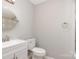 Modern bathroom featuring a tiled shower, brushed nickel fixtures, and a stylish vanity at 1138 Laurel St, Salisbury, NC 28144
