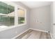 Well-lit laundry room with hardwood floors and hookups at 1138 Laurel St, Salisbury, NC 28144