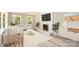 Bright living room featuring a fireplace, modern furniture, and large windows for natural light at 1138 Laurel St, Salisbury, NC 28144