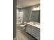 Bathroom featuring tile flooring, gray walls, and a shower with tub at 1411 Cottage Green Dr # 218, Monroe, NC 28112