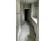 Bathroom with tile flooring, single sink vanity with white cabinetry and a shower with tub at 1411 Cottage Green Dr # 218, Monroe, NC 28112