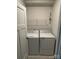 This Laundry Room has modern, side-by-side, front-load washing machine and dryer at 1411 Cottage Green Dr # 218, Monroe, NC 28112