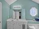 Bright bathroom with octagonal window and a large, framed mirror at 142 Family Ln, Mount Holly, NC 28120