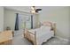 Bedroom with matching furniture and bright natural light at 142 Family Ln, Mount Holly, NC 28120