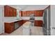 Functional kitchen featuring wood cabinets, stainless steel appliances, and a center island for meal preparation at 142 Family Ln, Mount Holly, NC 28120