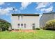 Back exterior with vinyl siding with a grassy area at 1432 Matthew Allen Cir, Kannapolis, NC 28081