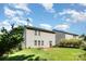 Sizable backyard view featuring house siding and lush greenery at 1432 Matthew Allen Cir, Kannapolis, NC 28081
