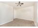 Bedroom featuring neutral walls, carpet, a ceiling fan, and a door at 1432 Matthew Allen Cir, Kannapolis, NC 28081