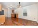 Dining area with chandelier, wood floors and cabinets plus plenty of natural light at 1432 Matthew Allen Cir, Kannapolis, NC 28081