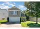 Charming two-story home with a two-car garage, complemented by a beautifully maintained lawn and landscaping at 1432 Matthew Allen Cir, Kannapolis, NC 28081
