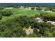 Expansive aerial view of a home surrounded by lush greenery and farmland at 1505 N Cansler St, Kings Mountain, NC 28086
