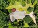 Overhead view showcasing the roof, landscaping, and driveway of a serene home at 1505 N Cansler St, Kings Mountain, NC 28086