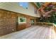 The large wooden deck is perfect for enjoying the greenery at 1505 N Cansler St, Kings Mountain, NC 28086