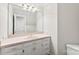 Neutral-toned bathroom featuring a vanity and a large mirror at 1505 N Cansler St, Kings Mountain, NC 28086