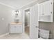 Cozy bathroom featuring tile flooring, a single sink vanity, and a toilet at 1505 N Cansler St, Kings Mountain, NC 28086