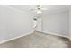 This bedroom features plush carpet, a ceiling fan, and neutral colors at 1505 N Cansler St, Kings Mountain, NC 28086